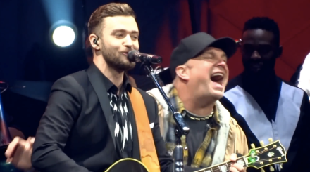 Garth Brooks reacts to Justin Timberlake on stage in Nashville